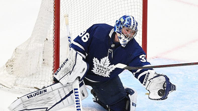 May 14, 2022; Toronto, Ontario, CAN; Toronto Maple Leafs goalie Jack Campbell (36) makes a glove save against the Tampa Bay Lightning in game seven of the first round of the 2022 Stanley Cup Playoffs at Scotiabank Arena. Mandatory Credit: Dan Hamilton-USA TODAY Sports