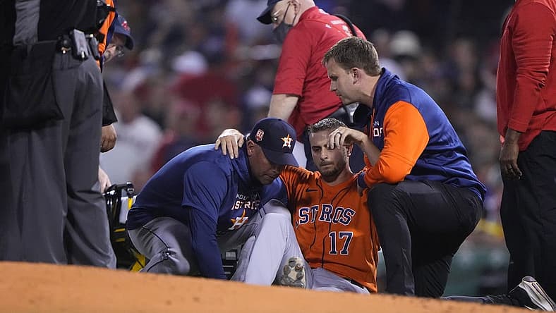 May 16, 2022; Boston, Massachusetts, USA; Houston Astros pitcher Jake Odorizzi (17) is helped onto a stretcher after suffering a leg injury during the fifth inning against the Boston Red Sox at Fenway Park. Mandatory Credit: Gregory Fisher-USA TODAY Sports
