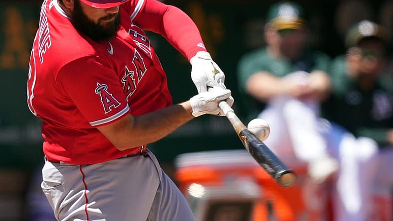 May 14, 2022; Oakland, California, USA; Los Angeles Angels catcher Austin Romine (19) bats against the Oakland Athletics during the fourth inning at RingCentral Coliseum. Mandatory Credit: Darren Yamashita-USA TODAY Sports