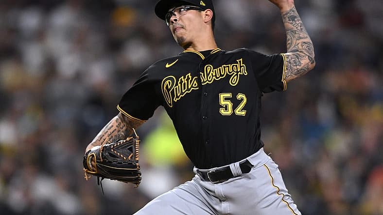 May 28, 2022; San Diego, California, USA; Pittsburgh Pirates relief pitcher Anthony Banda (52) throws a pitch against the San Diego Padres during the eighth inning at Petco Park. Mandatory Credit: Orlando Ramirez-USA TODAY Sports
