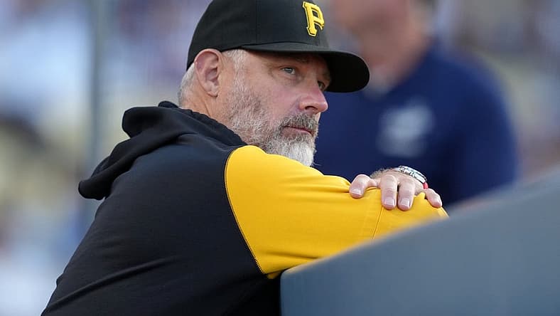 May 31, 2022; Los Angeles, California, USA; Pittsburgh Pirates manager Derek Shelton (17) watches from the dugout during the game against the Los Angeles Dodgers at Dodger Stadium. Mandatory Credit: Kirby Lee-USA TODAY Sports