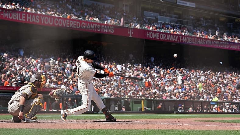 May 22, 2022; San Francisco, California, USA; San Francisco Giants first baseman Wilmer Flores (41) bats during the seventh inning against the San Diego Padres at Oracle Park. Mandatory Credit: Darren Yamashita-USA TODAY Sports