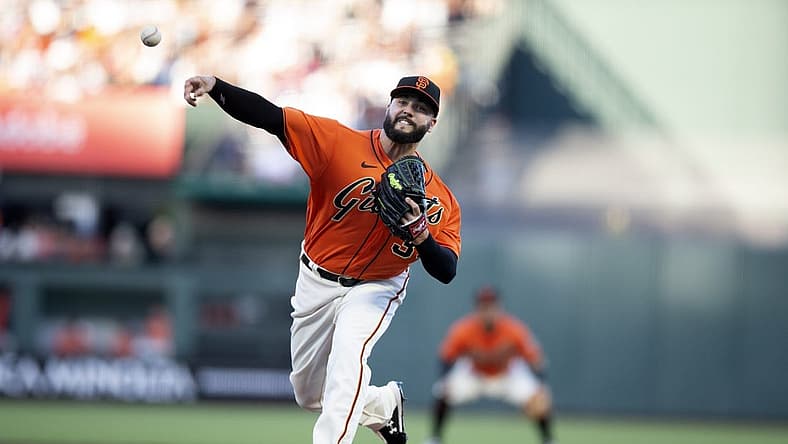 Jun 10, 2022; San Francisco, California, USA; San Francisco Giants starting pitcher Jakob Junis (34) delivers a pitch against the Los Angeles Dodgers during the first inning at Oracle Park. Mandatory Credit: D. Ross Cameron-USA TODAY Sports