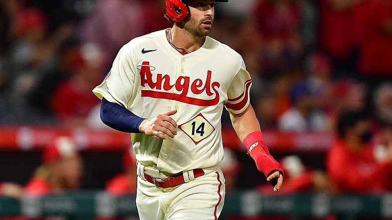 Jun 11, 2022; Anaheim, California, USA; Los Angeles Angels shortstop Tyler Wade (14) scores a run against the New York Mets during the eighth inning at Angel Stadium. Mandatory Credit: Gary A. Vasquez-USA TODAY Sports
