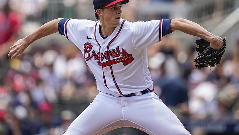 Jun 12, 2022; Cumberland, Georgia, USA; Atlanta Braves starting pitcher Kyle Wright (30) pitches against the Pittsburgh Pirates during the second inning at Truist Park. Mandatory Credit: Dale Zanine-USA TODAY Sports