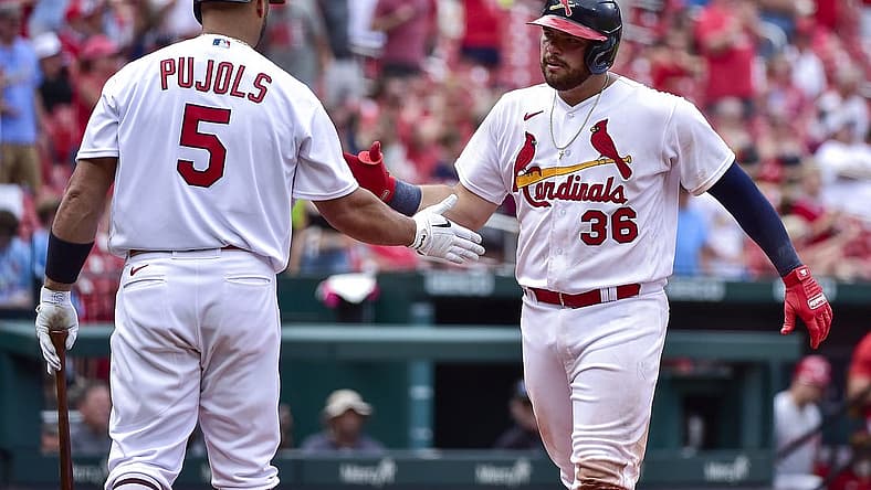 Jun 12, 2022; St. Louis, Missouri, USA; St. Louis Cardinals first baseman Juan Yepez (36) celebrates with designated hitter Albert Pujols (5) after hitting a two run home run against the Cincinnati Reds during the ninth inning at Busch Stadium. Mandatory Credit: Jeff Curry-USA TODAY Sports