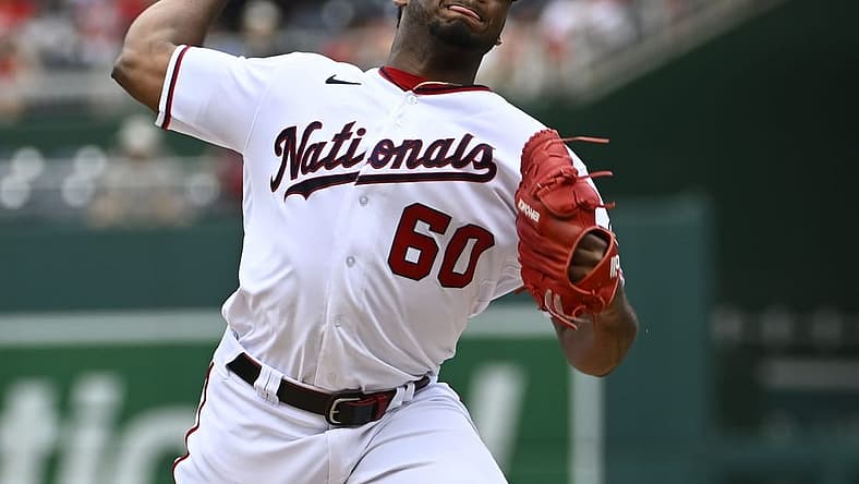 Jun 17, 2022; Washington, District of Columbia, USA; Washington Nationals pitcher Joan Adon (60) throws to the Philadelphia Phillies during the first inning at Nationals Park. Mandatory Credit: Brad Mills-USA TODAY Sports