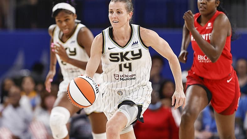 Jun 17, 2022; Chicago, Illinois, USA; Chicago Sky guard Allie Quigley (14) brings the ball up court against the Atlanta Dream during the second half of a WNBA game at Wintrust Arena. Mandatory Credit: Kamil Krzaczynski-USA TODAY Sports