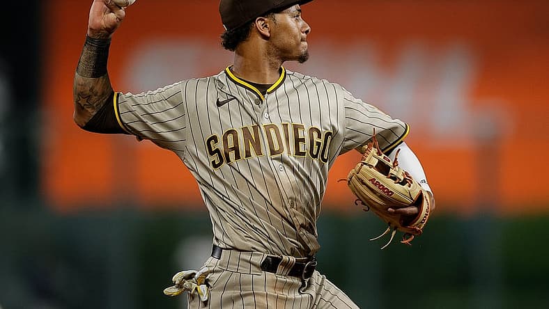 Jun 17, 2022; Denver, Colorado, USA; San Diego Padres third baseman Sergio Alcantara (41) makes a throw to first for an out in the seventh inning against the Colorado Rockies at Coors Field. Mandatory Credit: Isaiah J. Downing-USA TODAY Sports