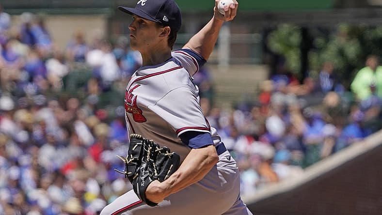 Jun 18, 2022; Chicago, Illinois, USA; Atlanta Braves starting pitcher Kyle Wright (30) throws the ball against the Chicago Cubs during the first inning at Wrigley Field. Mandatory Credit: David Banks-USA TODAY Sports