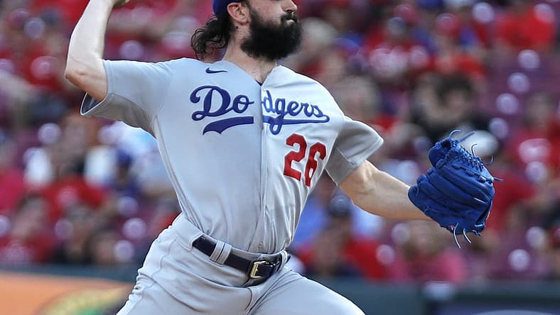 Jun 21, 2022; Cincinnati, Ohio, USA; Los Angeles Dodgers starting pitcher Tony Gonsolin (26) throws a pitch against the Cincinnati Reds during the first inning at Great American Ball Park. Mandatory Credit: David Kohl-USA TODAY Sports