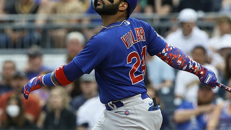 Jun 22, 2022; Pittsburgh, Pennsylvania, USA;  Chicago Cubs second baseman Jonathan Villar (24) hits a double against  the Pittsburgh Pirates during the second inning at PNC Park. Mandatory Credit: Charles LeClaire-USA TODAY Sports
