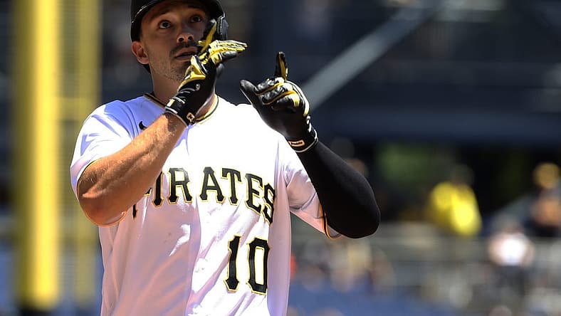Jun 23, 2022; Pittsburgh, Pennsylvania, USA; Pittsburgh Pirates center fielder Bryan Reynolds (10) reacts crossing home plate on a solo home run against the Chicago Cubs during the first inning at PNC Park. Mandatory Credit: Charles LeClaire-USA TODAY Sports