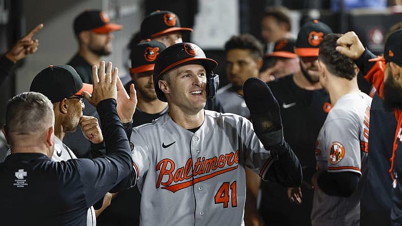 Jun 23, 2022; Chicago, Illinois, USA; Baltimore Orioles third baseman Tyler Nevin (41) celebrates after scoring against the Chicago White Sox during the ninth inning at Guaranteed Rate Field. Mandatory Credit: Kamil Krzaczynski-USA TODAY Sports