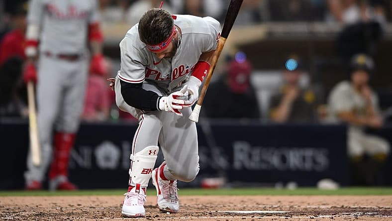 Jun 25, 2022; San Diego, California, USA; Philadelphia Phillies designated hitter Bryce Harper (3) reacts after being hit by a pitch during the fourth inning against the San Diego Padres at Petco Park. Mandatory Credit: Orlando Ramirez-USA TODAY Sports