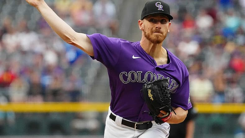 Jun 27, 2022; Denver, Colorado, USA; Colorado Rockies starting pitcher Chad Kuhl (41) delivers a pitch in the first inning against the Los Angeles Dodgers at Coors Field. Mandatory Credit: Ron Chenoy-USA TODAY Sports