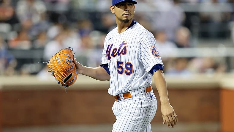 Jun 28, 2022; New York City, New York, USA; New York Mets starting pitcher Carlos Carrasco (59) walks off the field after being taken out of the game against the Houston Astros during the fifth inning at Citi Field. Mandatory Credit: Brad Penner-USA TODAY Sports