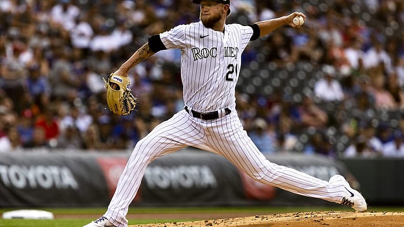 Jun 28, 2022; Denver, Colorado, USA; Colorado Rockies starting pitcher Kyle Freeland (21) pitches against the Los Angeles Dodgers during the first inning at Coors Field. Mandatory Credit: Michael Ciaglo-USA TODAY Sports