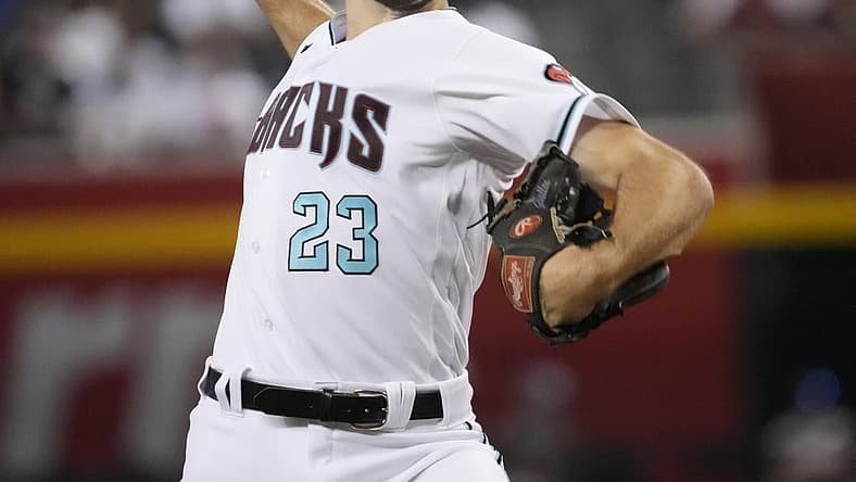 Jun 28, 2022; Phoenix, Ariz., U.S.; Arizona Diamondbacks starting pitcher Zac Gallen (23) throws against the San Diego Padres during the first inning at Chase Field.
Mlb Padres At D Backs
