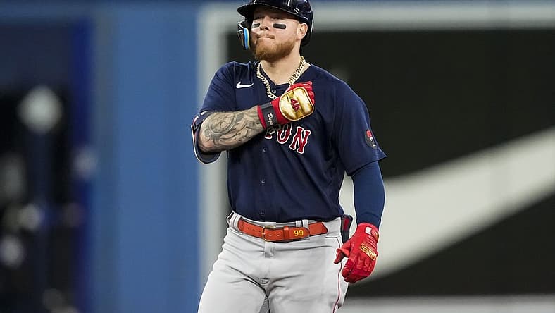 Jun 29, 2022; Toronto, Ontario, CAN; Boston Red Sox left fielder Alex Verdugo (99) celebrates after hitting a double during the tenth inning against the Toronto Blue Jays at Rogers Centre. Mandatory Credit: Kevin Sousa-USA TODAY Sports