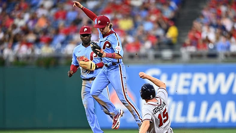 Jun 30, 2022; Philadelphia, Pennsylvania, USA; Philadelphia Phillies infielder Bryson Stott (5) forces out Atlanta Braves infielder Phil Gosselin (15) in the seventh inning at Citizens Bank Park. Mandatory Credit: Kyle Ross-USA TODAY Sports