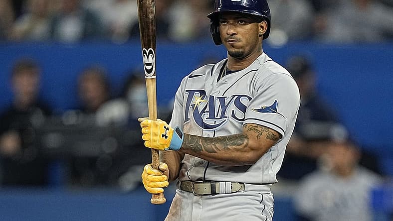 Jun 30, 2022; Toronto, Ontario, CAN; Tampa Bay Rays shortstop Wander Franco (5) looks at his bat during during the seventh inning against the Toronto Blue Jays at Rogers Centre. Mandatory Credit: John E. Sokolowski-USA TODAY Sports