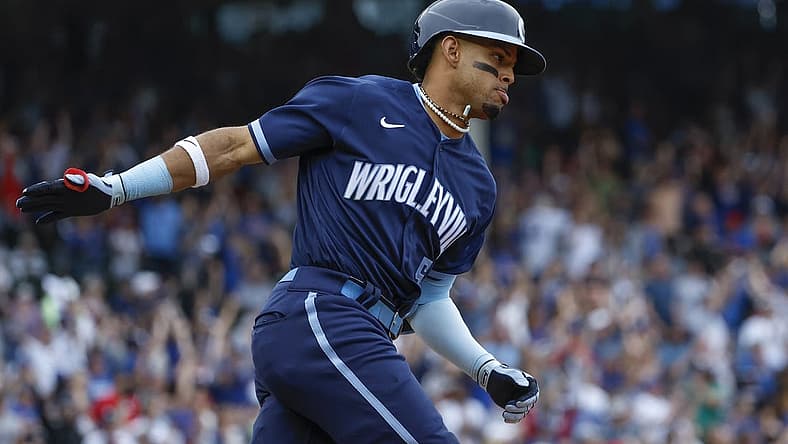 Jul 1, 2022; Chicago, Illinois, USA; Chicago Cubs center fielder Christopher Morel (5) rounds the bases after hitting a two-run home run against the Boston Red Sox during the sixth inning at Wrigley Field. Mandatory Credit: Kamil Krzaczynski-USA TODAY Sports