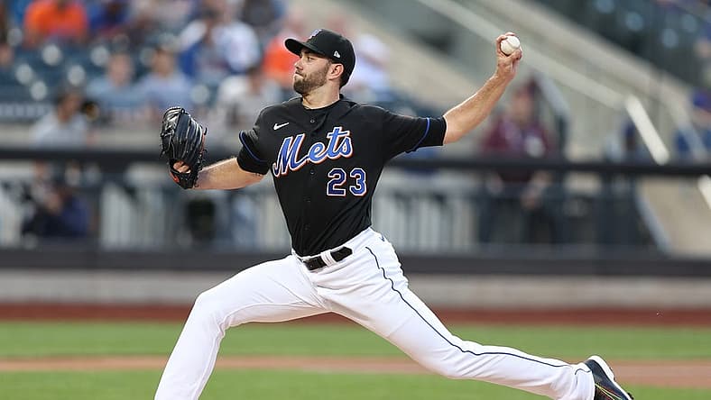 Jul 1, 2022; New York City, New York, USA; New York Mets starting pitcher David Peterson (23) delivers a pitch during the first inning against the Texas Rangers at Citi Field. Mandatory Credit: Vincent Carchietta-USA TODAY Sports
