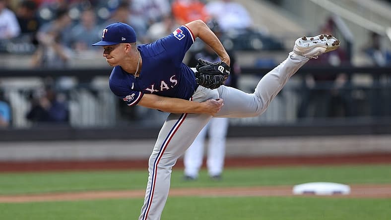 Jul 1, 2022; New York City, New York, USA;  Texas Rangers starting pitcher Glenn Otto (49) delivers a pitch during the first inning against the New York Mets at Citi Field. Mandatory Credit: Vincent Carchietta-USA TODAY Sports