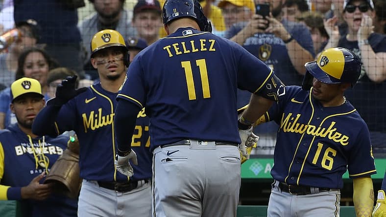 Jul 1, 2022; Pittsburgh, Pennsylvania, USA;  Milwaukee Brewers shortstop Willy Adames (27) and second baseman Kolten Wong (16) congratulate first baseman Rowdy Tellez (11) on his three run home run against the Pittsburgh Pirates during the second inning at PNC Park. Mandatory Credit: Charles LeClaire-USA TODAY Sports
