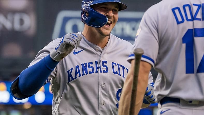 Jul 1, 2022; Detroit, Michigan, USA; Kansas City Royals designated hitter Vinnie Pasquantino (9) celebrates with first baseman Hunter Dozier (17) after hitting a solo home run during the fourth inning against the Detroit Tigers at Comerica Park. Mandatory Credit: Raj Mehta-USA TODAY Sports