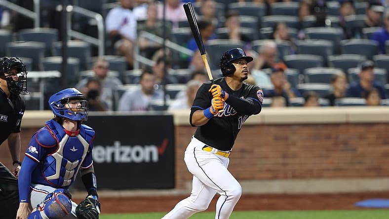 Jul 1, 2022; New York City, New York, USA; New York Mets third baseman Eduardo Escobar (10) looks up at his three run home run during the fourth inning against the Texas Rangers at Citi Field. Mandatory Credit: Vincent Carchietta-USA TODAY Sports