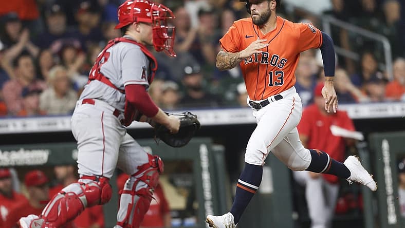 Jul 1, 2022; Houston, Texas, USA; Houston Astros designated hitter J.J. Matijevic (13) scores against the Los Angeles Angels in the third inning at Minute Maid Park. Mandatory Credit: Thomas Shea-USA TODAY Sports