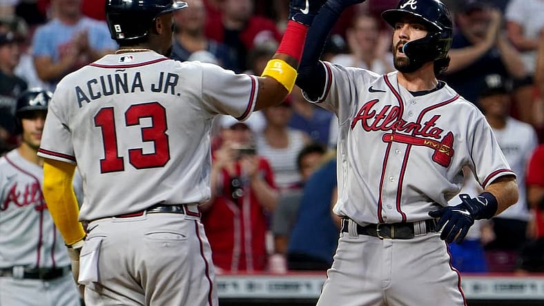 Atlanta Braves shortstop Dansby Swanson (7), right, is congratulated by Atlanta Braves designated hitter Ronald Acuna Jr. (13), left, after hitting three-run home run during the seventh inning of a baseball game against the Cincinnati Reds, Friday, July 1, 2022, at Great American Ball Park in Cincinnati. The Atlanta Braves won, 9-1.
Atlanta Braves At Cincinnati Reds July 1 0036
