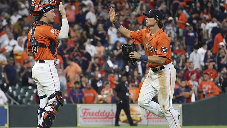 Jul 1, 2022; Houston, Texas, USA; Houston Astros catcher Korey Lee (38) and Houston Astros center fielder Jake Meyers (6) celebrate defeating the Los Angeles Angels at Minute Maid Park. Mandatory Credit: Thomas Shea-USA TODAY Sports