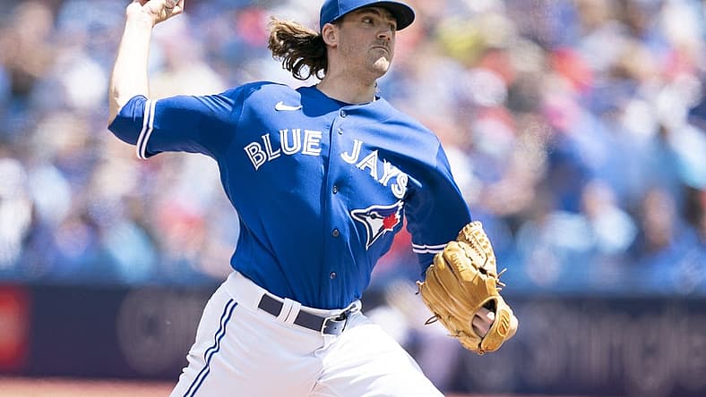 Jul 2, 2022; Toronto, Ontario, CAN; Toronto Blue Jays starting pitcher Kevin Gausman (34) throws a pitch against the Tampa Bay Rays during the first inning at Rogers Centre. Mandatory Credit: Nick Turchiaro-USA TODAY Sports