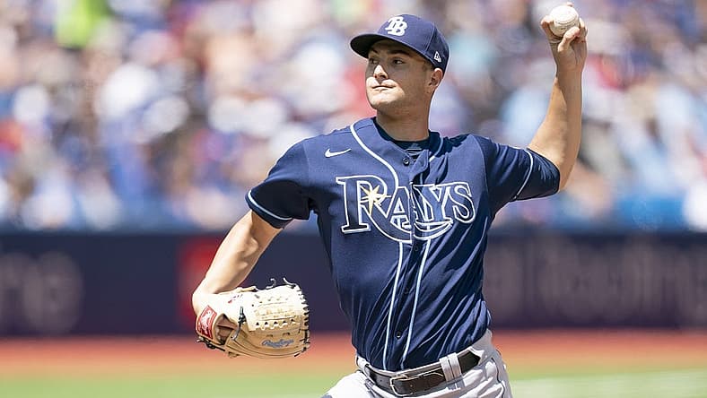 Jul 2, 2022; Toronto, Ontario, CAN; Tampa Bay Rays starting pitcher Shane McClanahan (18) throws a pitch against the Toronto Blue Jays during the first inning at Rogers Centre. Mandatory Credit: Nick Turchiaro-USA TODAY Sports