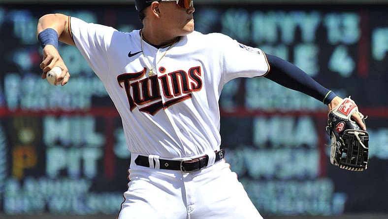 Jul 2, 2022; Minneapolis, Minnesota, USA; Minnesota Twins third baseman Gio Urshela (15) makes a putout against the Baltimore Orioles during the third inning at Target Field. Mandatory Credit: Jeffrey Becker-USA TODAY Sports