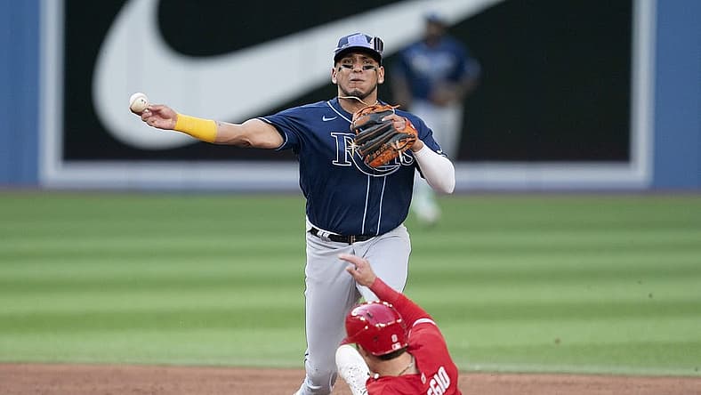 Jul 2, 2022; Toronto, Ontario, CAN; Tampa Bay Rays second baseman Isaac Paredes (17) forces out Toronto Blue Jays second baseman Cavan Biggio (8) at second base during the third inning at Rogers Centre. Mandatory Credit: Nick Turchiaro-USA TODAY Sports