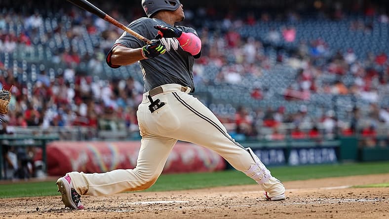 Jul 2, 2022; Washington, District of Columbia, USA; Washington Nationals right fielder Juan Soto (22) hits a home run against the Miami Marlins during the sixth inning at Nationals Park. Mandatory Credit: Scott Taetsch-USA TODAY Sports