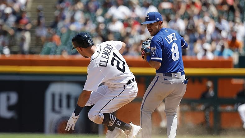 Jul 3, 2022; Detroit, Michigan, USA;  Detroit Tigers second baseman Kody Clemens (21) slides in safe at second in front of Kansas City Royals second baseman Nicky Lopez (8) during the fifth inning at Comerica Park. Mandatory Credit: Rick Osentoski-USA TODAY Sports