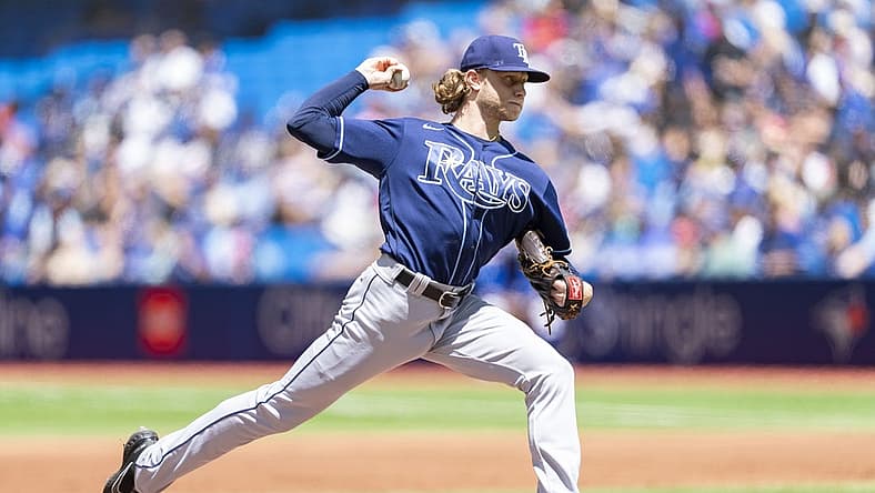 Jul 3, 2022; Toronto, Ontario, CAN; Tampa Bay Rays starting pitcher Shane Baz (11) delivers a pitch against the Toronto Blue Jays during the first inning at Rogers Centre. Mandatory Credit: Kevin Sousa-USA TODAY Sports