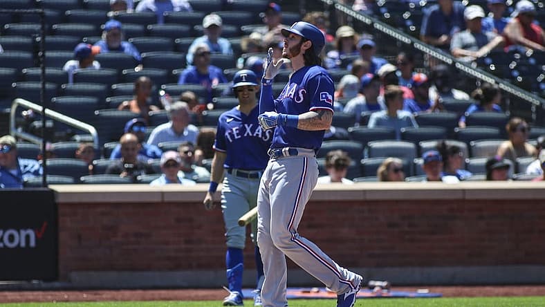 Jul 3, 2022; New York City, New York, USA; Texas Rangers catcher Jonah Heim (28) crosses home plate after hitting a solo home run in the third inning against the New York Mets at Citi Field. Mandatory Credit: Wendell Cruz-USA TODAY Sports