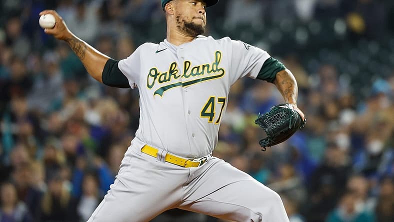 Jul 3, 2022; Seattle, Washington, USA; Oakland Athletics starting pitcher Frankie Montas (47) throws against the Seattle Mariners during the first inning at T-Mobile Park. Mandatory Credit: Joe Nicholson-USA TODAY Sports
