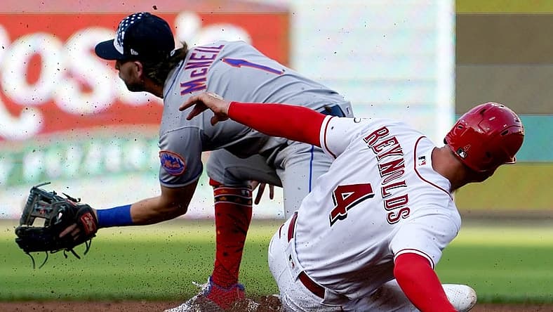 Cincinnati Reds shortstop Matt Reynolds (4) slides safely to second base during the third inning of a baseball game against the New York Mets, Monday, July 4, 2022, at Great American Ball Park in Cincinnati.
New York Mets At Cincinnati Reds July 1 0028