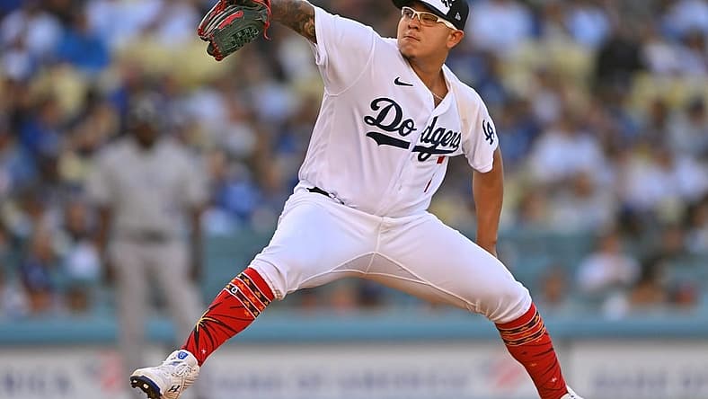 Jul 4, 2022; Los Angeles, California, USA; Los Angeles Dodgers starting pitcher Julio Urias (7) throws to the plate in the second inning of the game against the Colorado Rockies at Dodger Stadium. Mandatory Credit: Jayne Kamin-Oncea-USA TODAY Sports