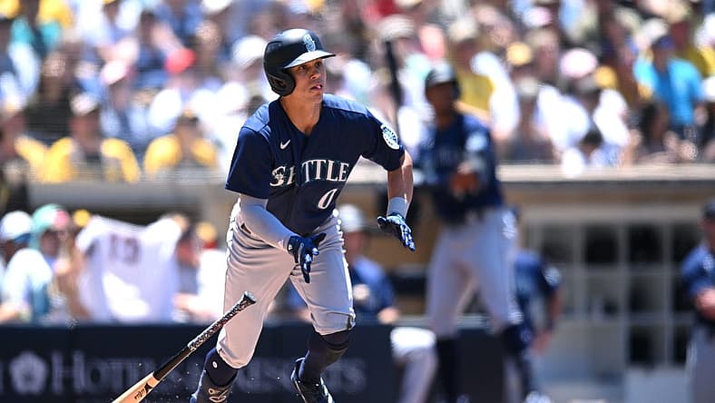 Jul 5, 2022; San Diego, California, USA; Seattle Mariners left fielder Sam Haggerty (0) hits a home run during the third inning against the San Diego Padres at Petco Park. Mandatory Credit: Orlando Ramirez-USA TODAY Sports