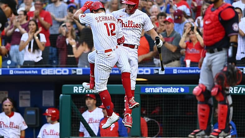 Jul 5, 2022; Philadelphia, Pennsylvania, USA; Philadelphia Phillies outfielder Kyle Schwarber (12) celebrates with first baseman Rhys Hoskins (17) after hitting a home run against the Washington Nationals in the third inning at Citizens Bank Park. Mandatory Credit: Kyle Ross-USA TODAY Sports