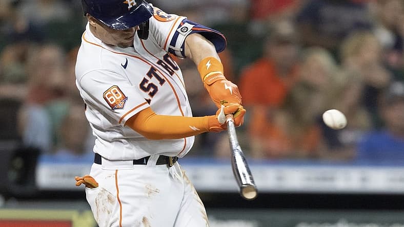 Jul 5, 2022; Houston, Texas, USA;  Houston Astros first baseman Aledmys Diaz (16) hits a single against the Kansas City Royals in the second inning at Minute Maid Park. Mandatory Credit: Thomas Shea-USA TODAY Sports