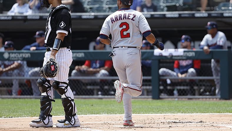 Jul 6, 2022; Chicago, Illinois, USA; Minnesota Twins first baseman Luis Arraez (2) scores against the Chicago White Sox during the first inning at Guaranteed Rate Field. Mandatory Credit: Kamil Krzaczynski-USA TODAY Sports